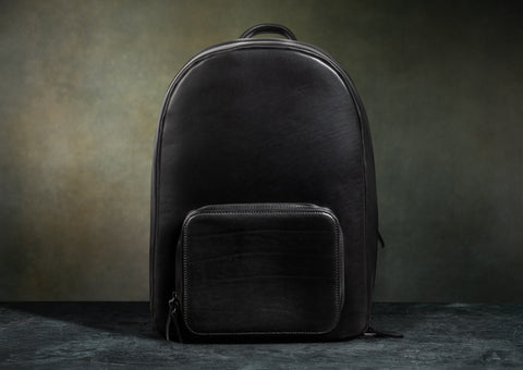 black vegetable tanned leather backpack