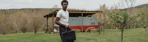 model holding black founder