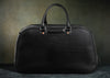 black leather weekender bag front view