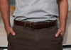 Model wearing high quality 1.25 inch Mens brown leather dress belt