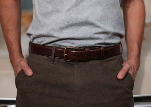 Model wearing high quality 1.25 inch Mens brown leather dress belt