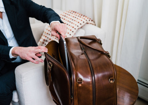 brown leather duffle bag with special padded laptop pocket