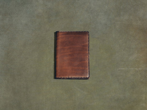 brown leather passport wallet