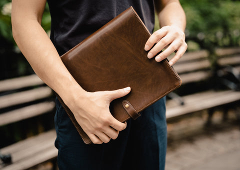 close shot of brown vegetable tanned leather padfolio