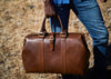 brown vegetable tanned leather duffle bag