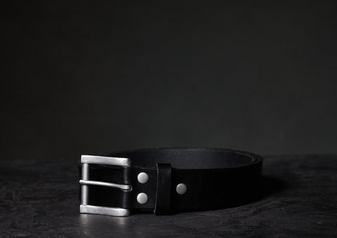 black leather belt w/ silver buckle