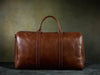 brown leather duffle bag